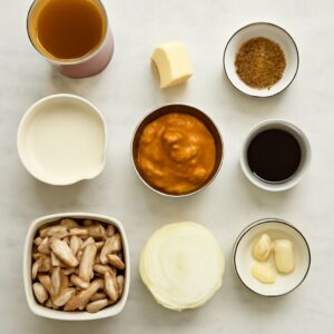 A bowl of spicy pumpkin soup made from canned pumpkin, served in a pumpkin