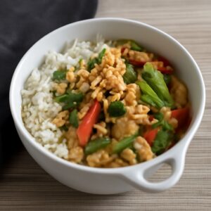 dish featuring chicken peanut sauce and coconut peanut sauce
