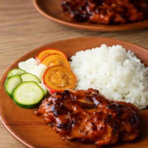 A delicious Filipino chicken soup with soy sauce broth and Filipino bbq sauce