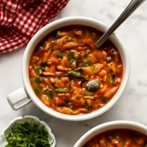 A bowl of Italian minestrone soup with fresh vegetables
